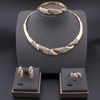 Glamoröst Halsband, Armband, Örhängen och Ring i Tvinnad Design